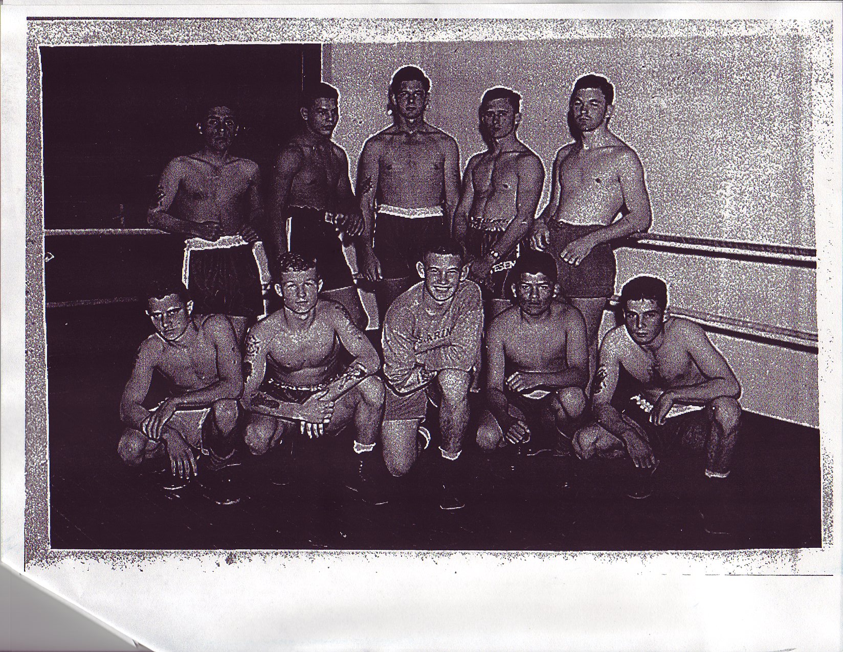 Theodore and other men in boxing attire.